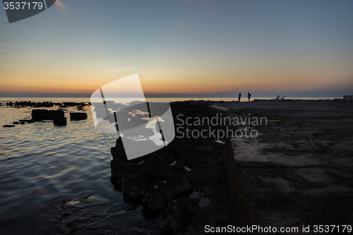 Image of gorgeous sunset on the rocky coast of Adriatic