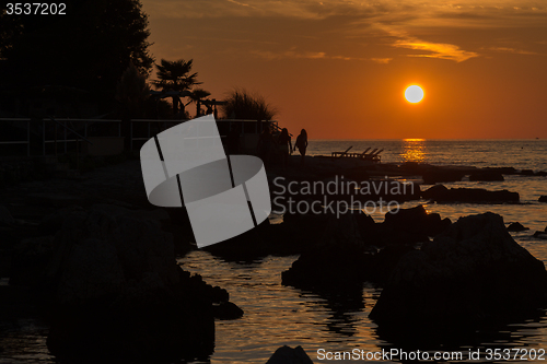 Image of gorgeous sunset on the rocky coast of Adriatic