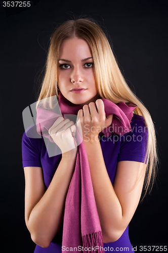 Image of Young attractive woman with scarf