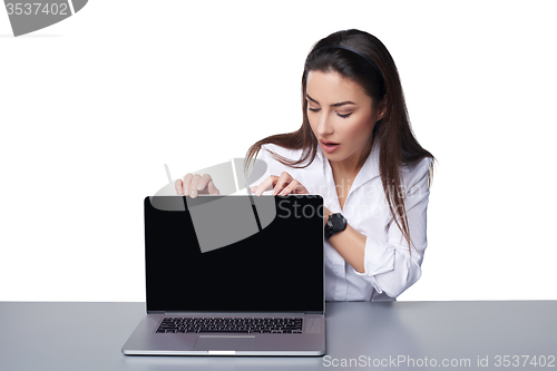 Image of Business woman showing black laptop screen