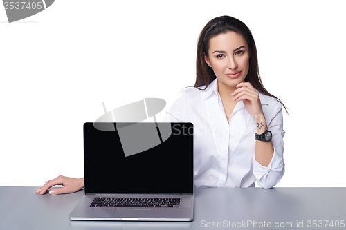 Image of Business woman showing black laptop screen