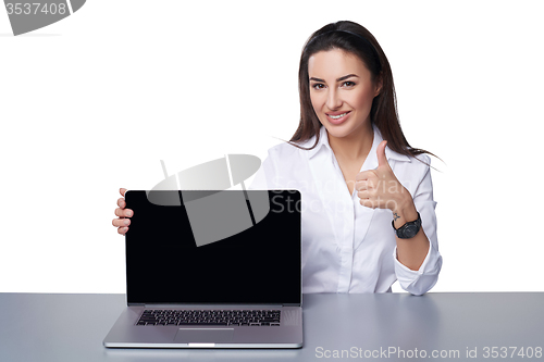 Image of Business woman showing black laptop screen