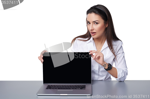 Image of Business woman showing black laptop screen