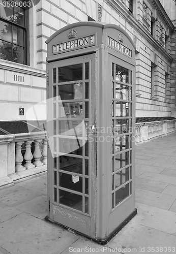 Image of Black and white Red phone box in London
