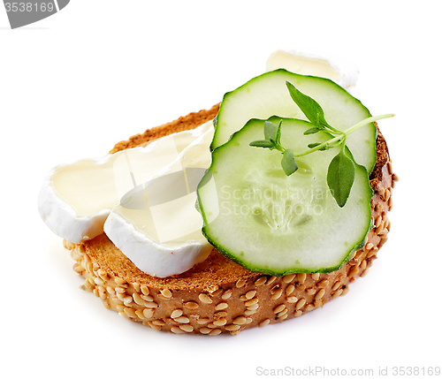 Image of toasted bread with brie and cucumber