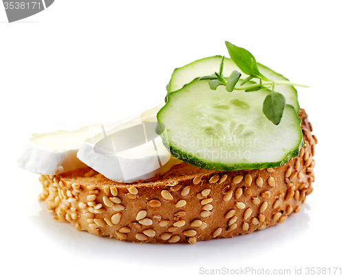 Image of toasted bread with brie and cucumber