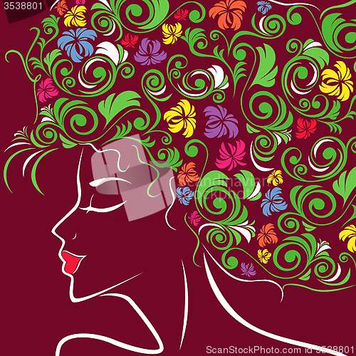 Image of Women head profile with floral hair