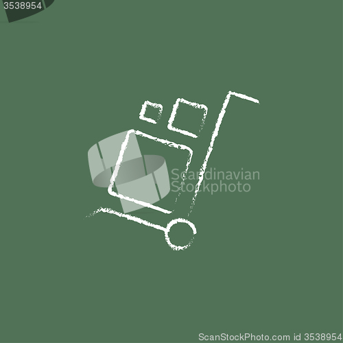 Image of Shopping handling trolley icon drawn in chalk.