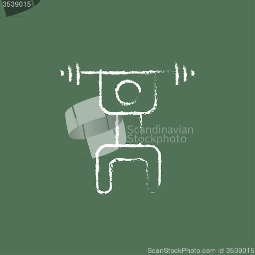 Image of Man with barbell icon drawn in chalk.