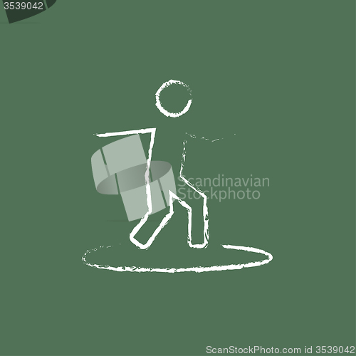 Image of Man on a surfboard icon drawn in chalk.