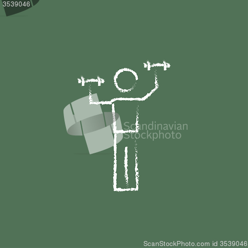Image of Man with dumbbell icon drawn in chalk.