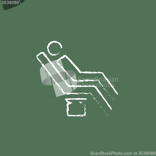 Image of Man sitting on a dental chair icon drawn in chalk.