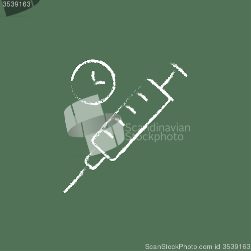 Image of Syringe icon drawn in chalk.