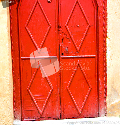 Image of historical marble  in  antique building door morocco      style 