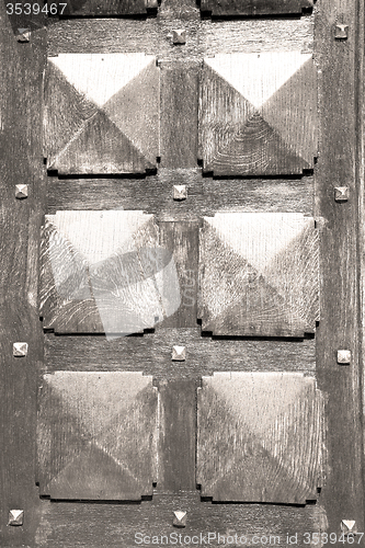 Image of  traditional   door    in italy   ancian wood and traditional  t