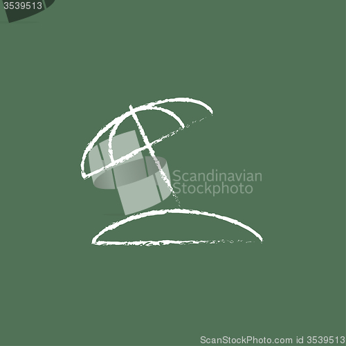 Image of Beach umbrella icon drawn in chalk.