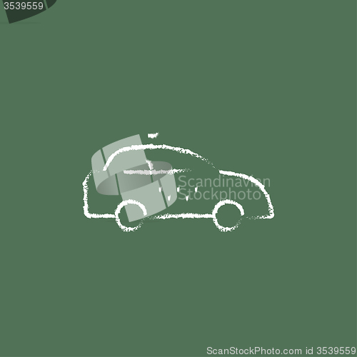 Image of Taxi car icon drawn in chalk.