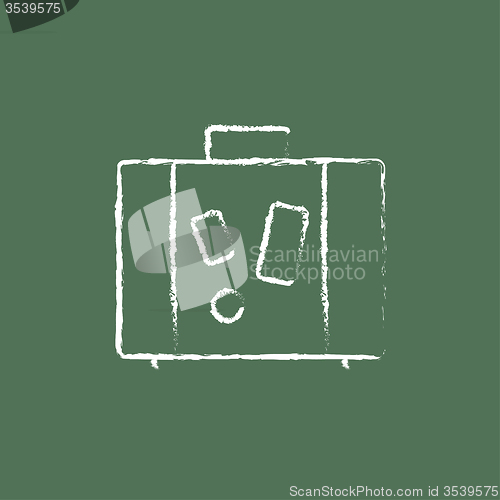 Image of Suitcase icon drawn in chalk.