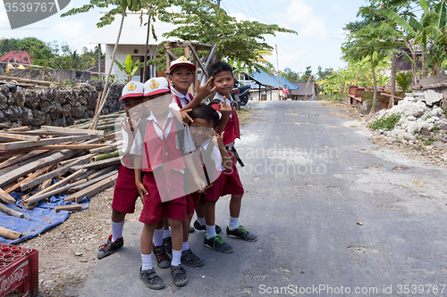 Image of Balinese hindu boys in school uniform 