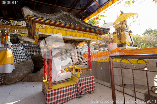 Image of Unidentified Balinese monk at praying ceremony