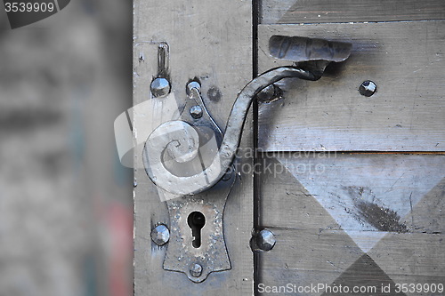 Image of Ancient door handle on the gates