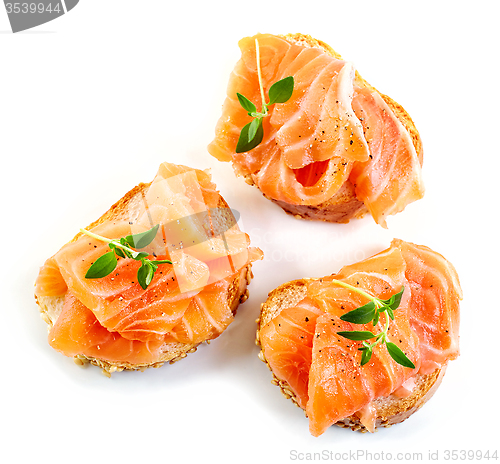 Image of bread with fresh salmon fillet