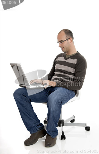 Image of Working on a laptop