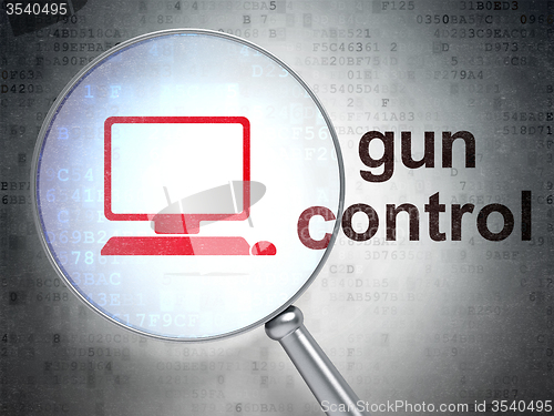 Image of Safety concept: Computer Pc and Gun Control with optical glass