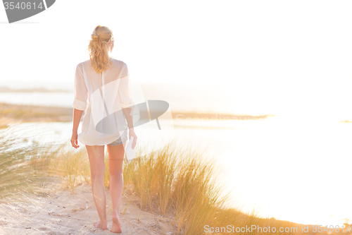 Image of Free Happy Woman Enjoying Sun on Vacations.