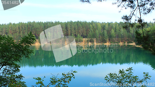 Image of landscape with picturesque lake in the pine forest