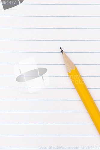 Image of pencil on notebook