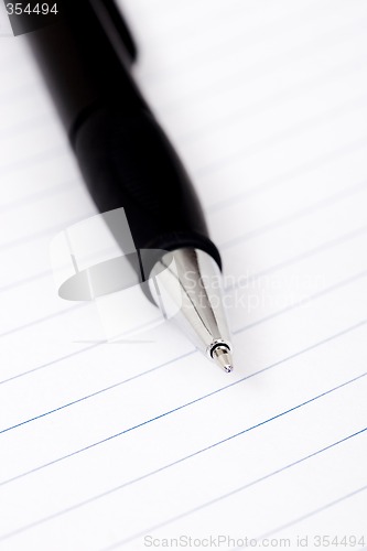 Image of pen on notebook