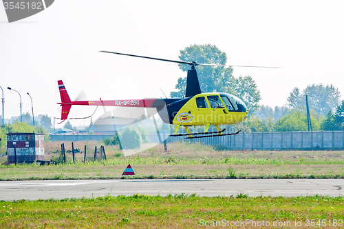 Image of Pilot of Robinson R44 Raven on airshow