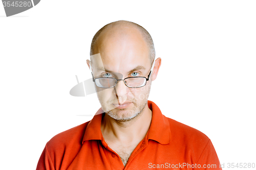 Image of man in a red T-shirt. Studio. isolated