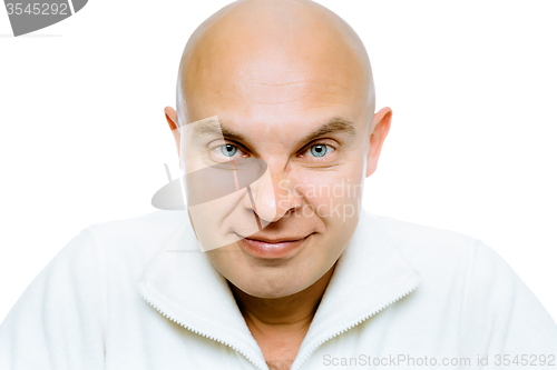 Image of Bald evil grinning man. Isolated. Studio
