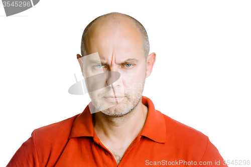 Image of man scowling. Isolated on white. Studio