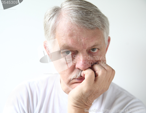 Image of man with bored expression