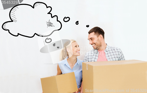 Image of couple with delivery boxes moving to new home