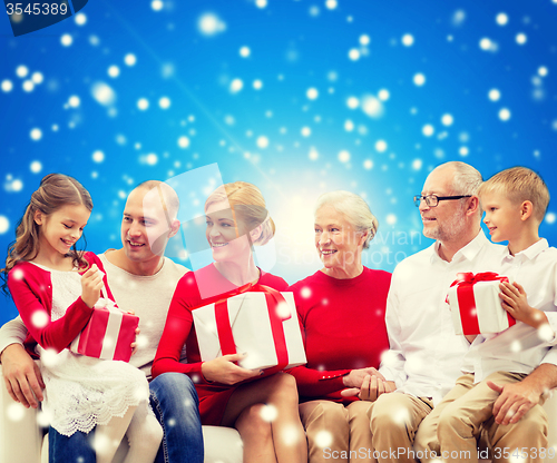 Image of smiling family with gifts