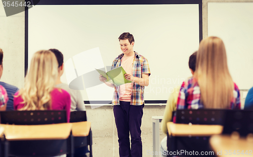 Image of group of smiling students in classroom