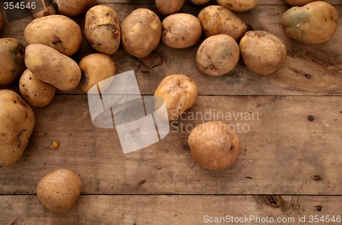 Image of potatos on a old market