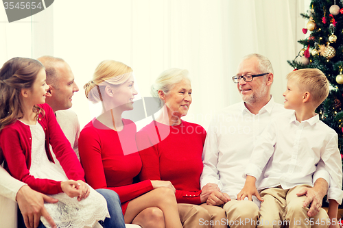 Image of smiling family at home