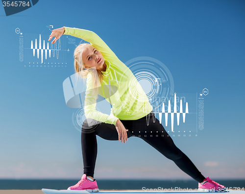 Image of woman doing sports outdoors