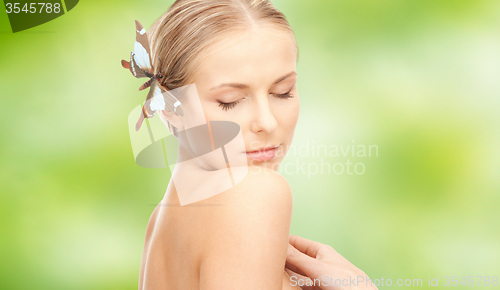 Image of beautiful young happy woman with long hair