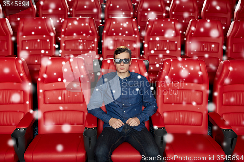 Image of young man watching movie in 3d theater