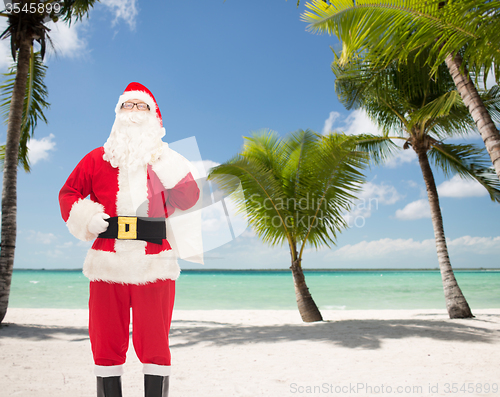 Image of man in costume of santa claus with bag