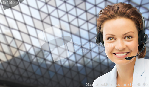 Image of helpline operator in headset over grid background