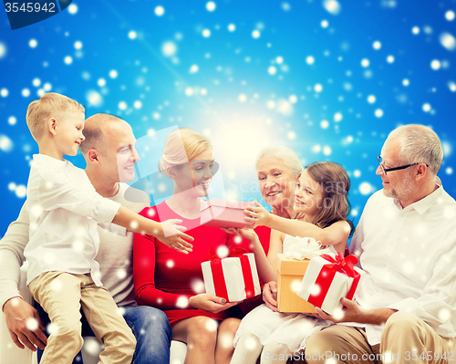 Image of smiling family with gifts