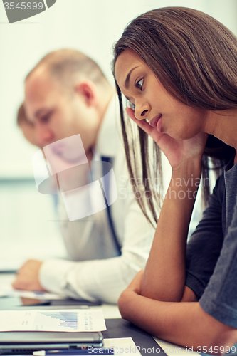 Image of business people having problem in office