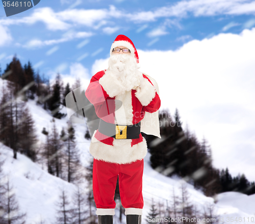 Image of man in costume of santa claus with bag